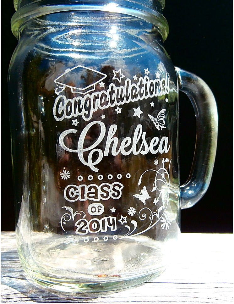 http://stockingfactory.com/cdn/shop/products/graduation-graduation-class-of-2022-gift-engraved-mason-jar-glasses-personalized-drinking-mug-glass-etched-gift-party-favor-graduate-gift-28535813996608_1024x1024.jpg?v=1660171671