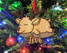 https://stockingfactory.com/cdn/shop/products/christmas-ornaments-wooden-cute-sleeping-deer-personalized-christmas-ornament-for-kids-girls-or-boys-cute-customized-reindeer-christmas-2020-gift-idea-28960416366656_220x220.jpg?v=1671428147